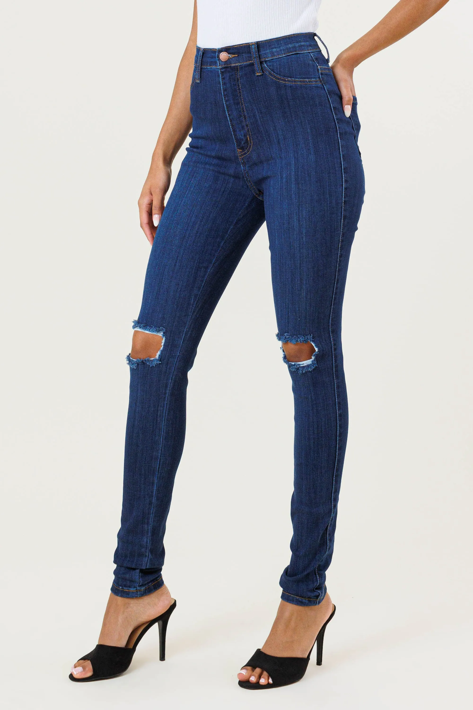 HIGH WAISTED SKINNY W DISTRESS DETAIL