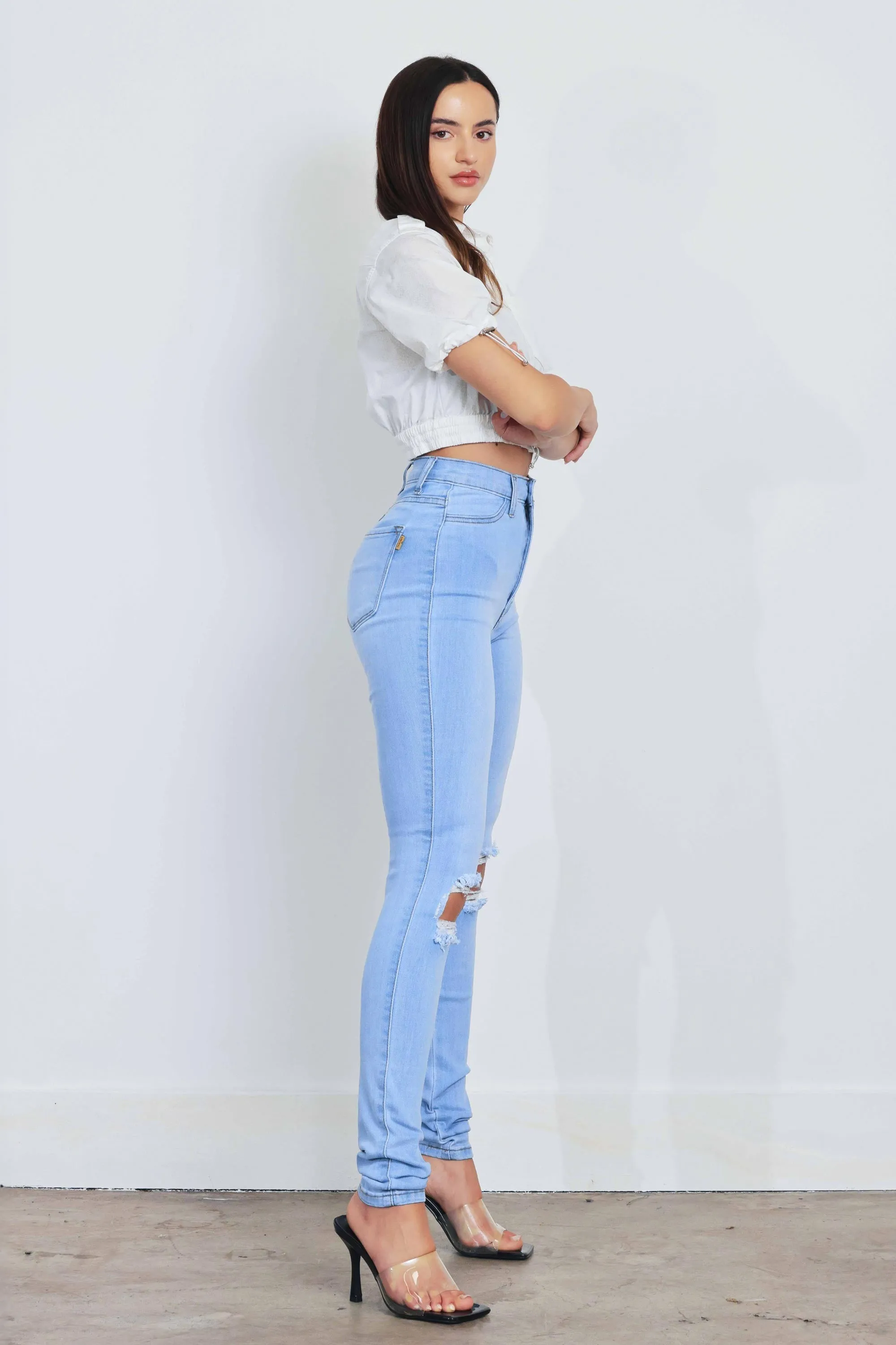 HIGH WAISTED SKINNY W DISTRESS DETAIL