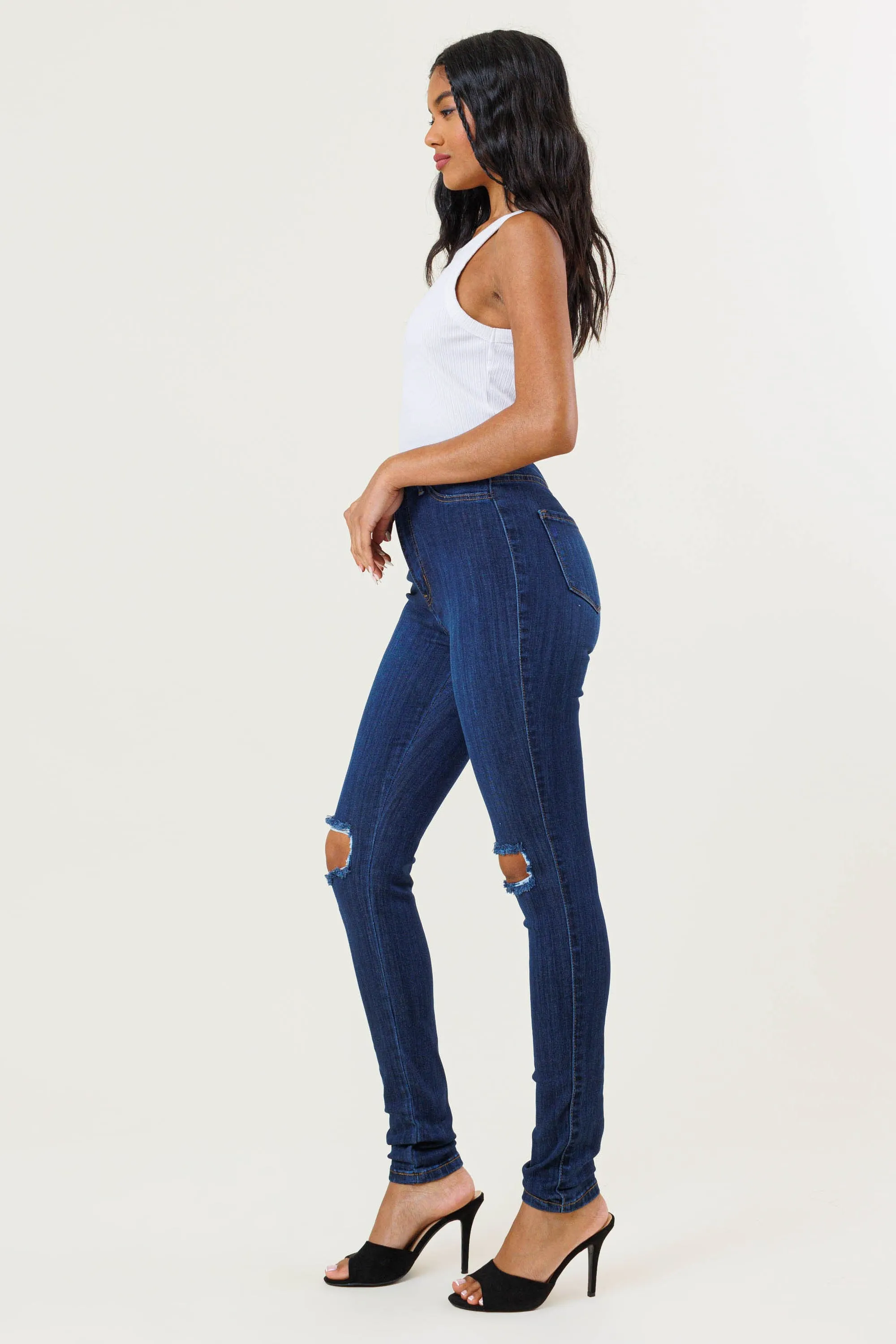 HIGH WAISTED SKINNY W DISTRESS DETAIL