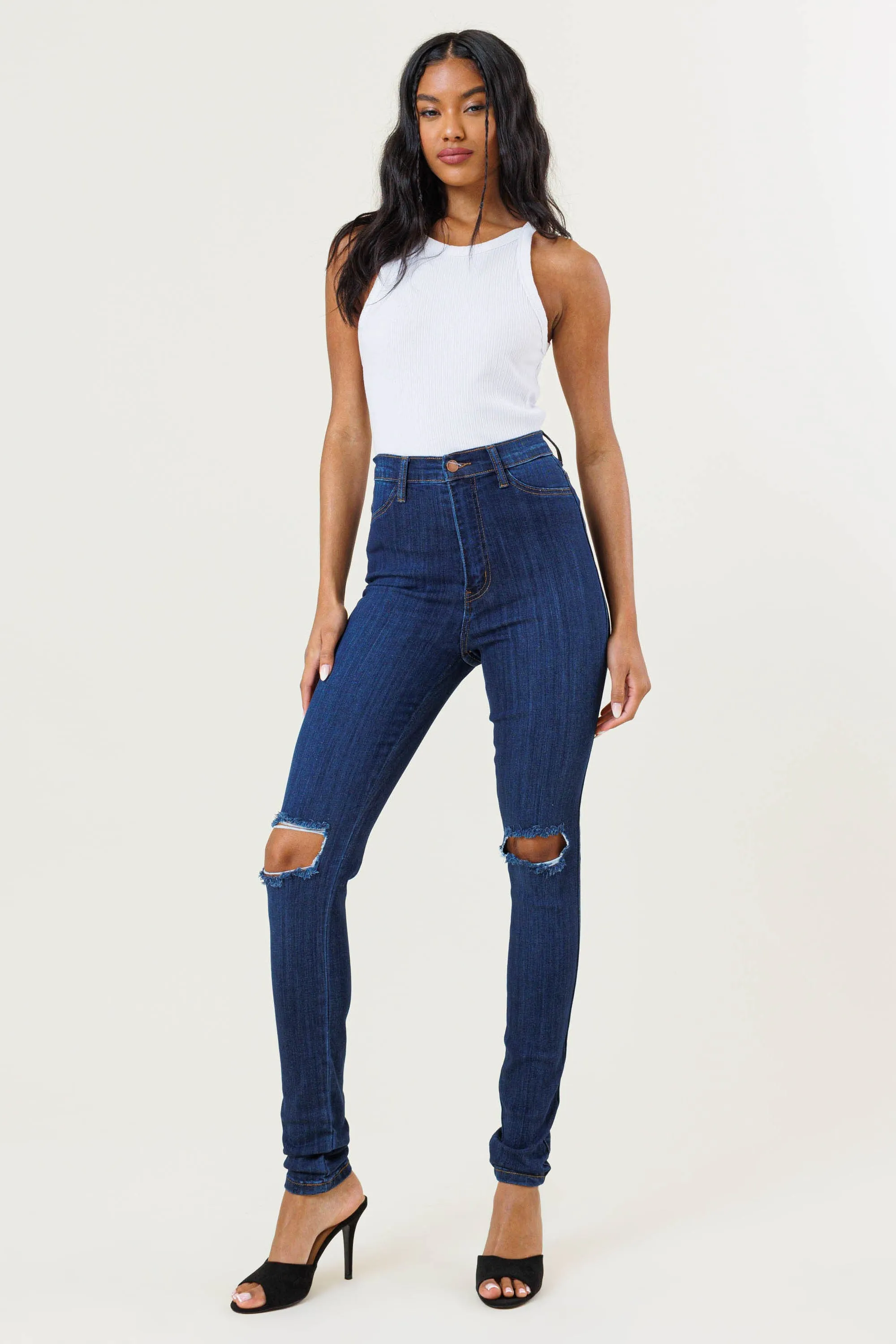 HIGH WAISTED SKINNY W DISTRESS DETAIL
