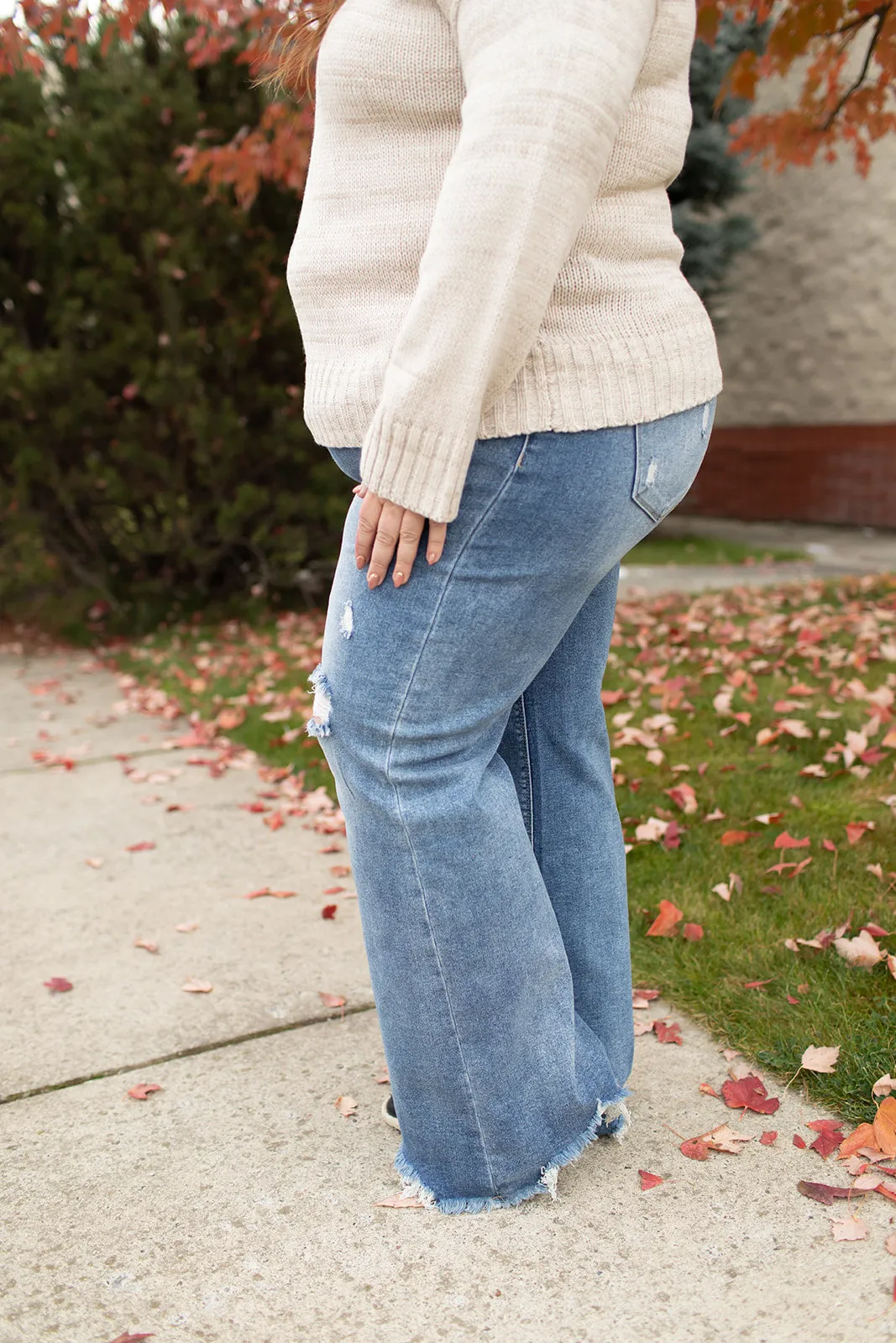 Risen High Rise Frayed Hem Wide Leg Jeans